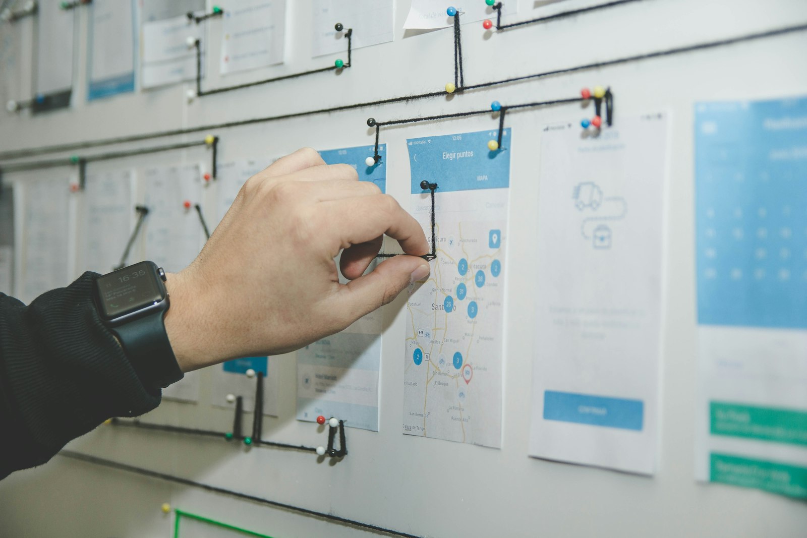 Designers sketching UI layouts